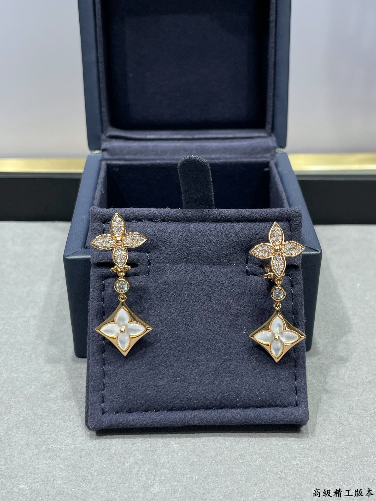 lv two flower Di*m*nd white shell earrings