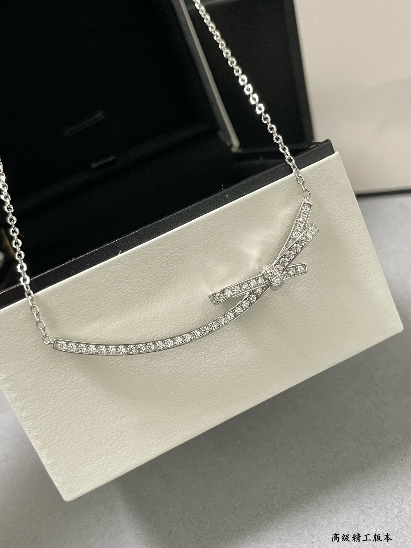 Ch*el bow tie necklace