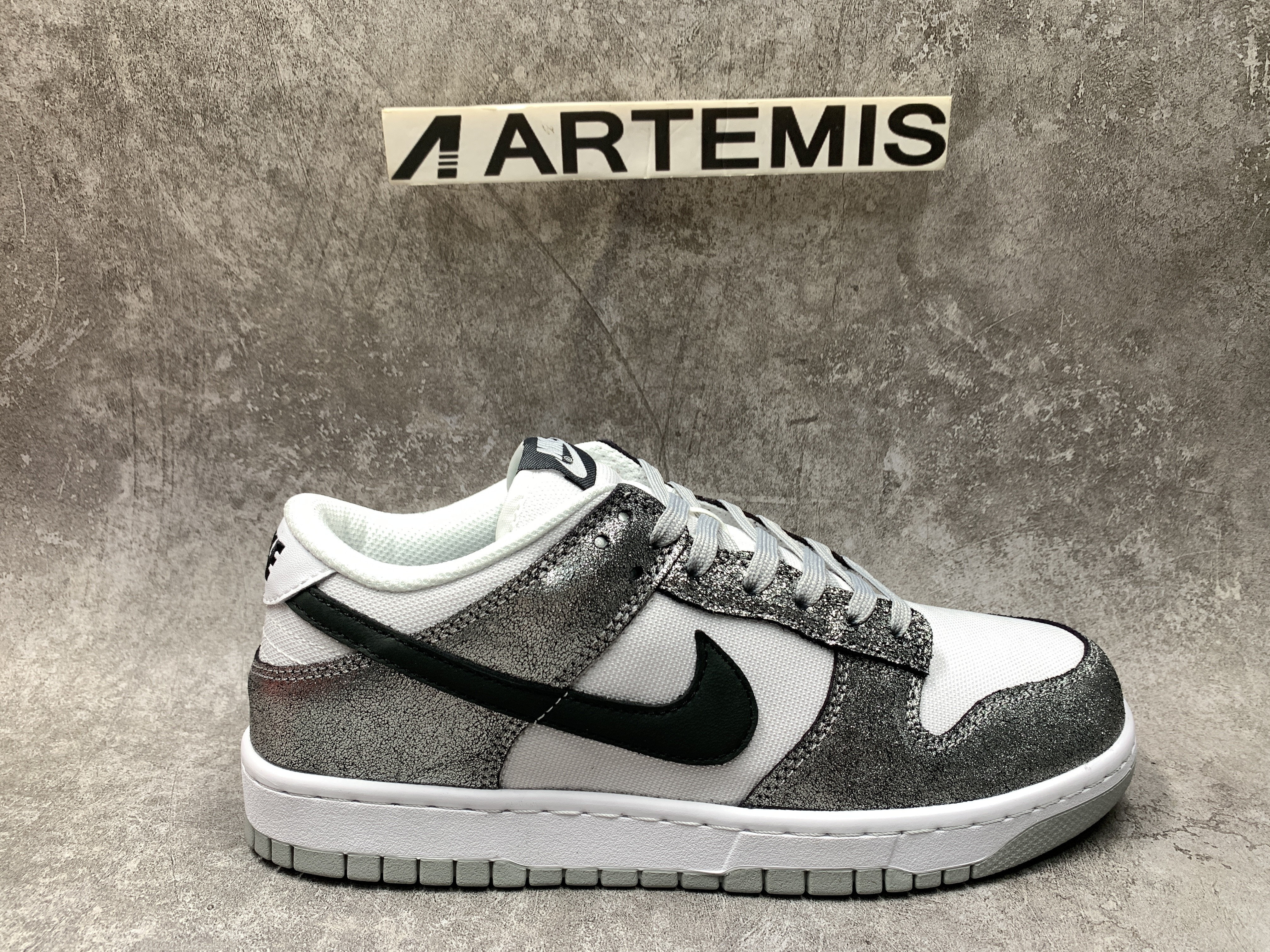 Nike Dunk Low Features Silver Cracked Leather