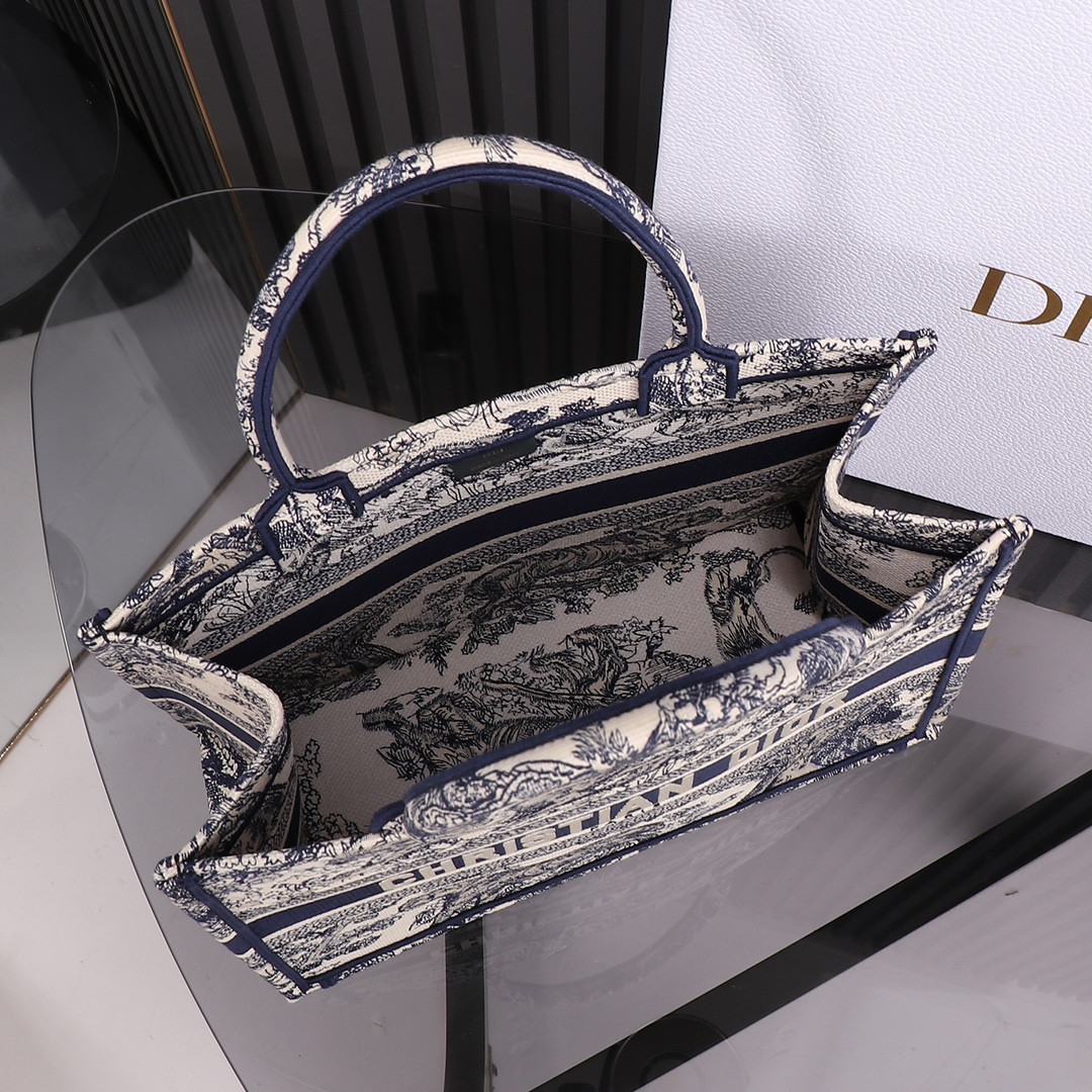 medium D*or book tote ecru and blue toile de jouy embroidery 14 x 11 x 6.5 inches