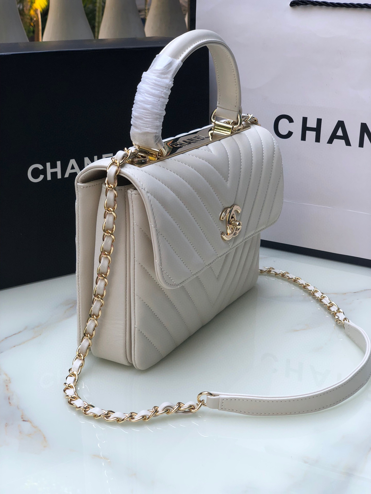 Ch*el flap bag with top handle white 6.6 × 9.8 × 4.7 in