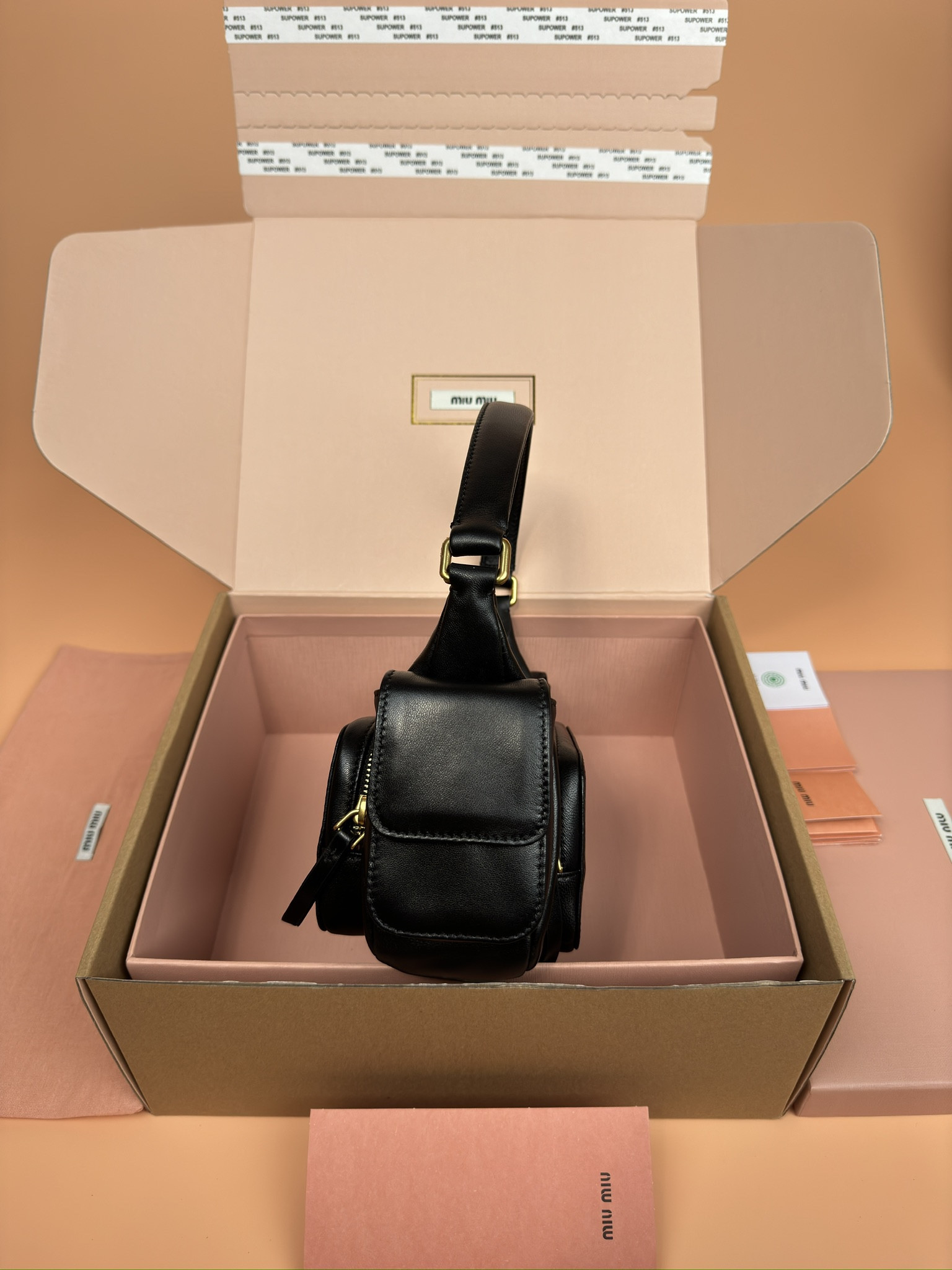 Miu Miu Hobo Nappa leather pocket bag 12x21x6cm